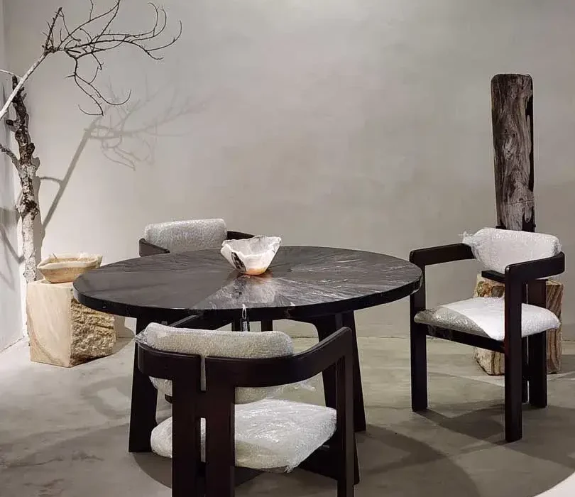 Black Rounded Table for Dinner Interior Bali petrified wood furniture for luxury interior design